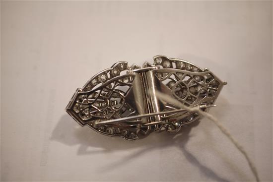 A 20th century Art Deco style white gold? and diamond double clip brooch, 65mm.